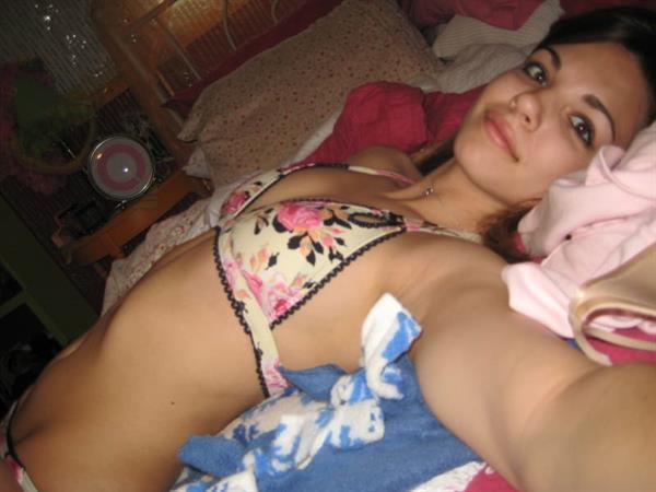 Jessica Ashley in a bikini taking a selfie