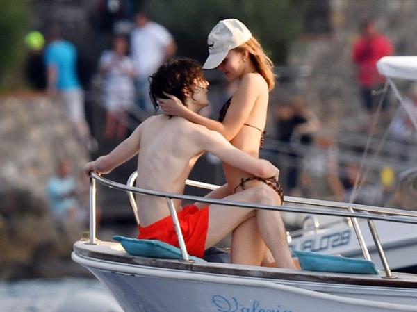 Lily-Rose Depp sexy ass in a little thong bikini making out with Timothee Chalamet on a boat seen by paparazzi.





