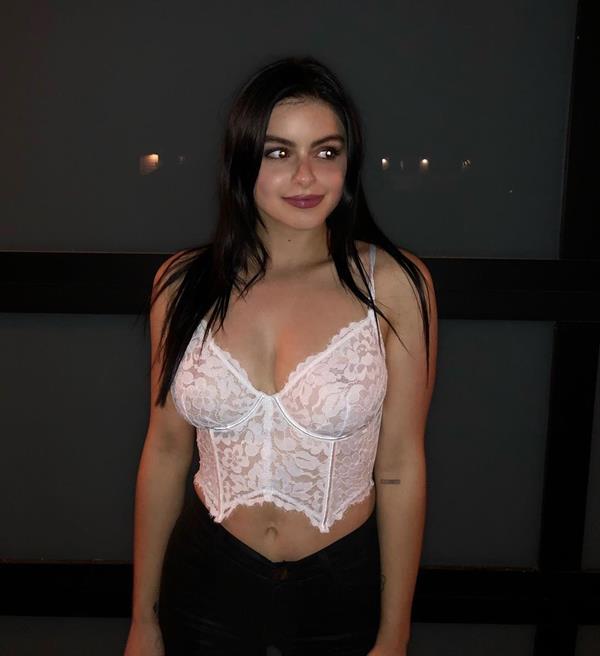Ariel Winter sexy see through lace white top showing off her boobs.














