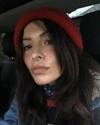 Sarah Shahi taking a selfie