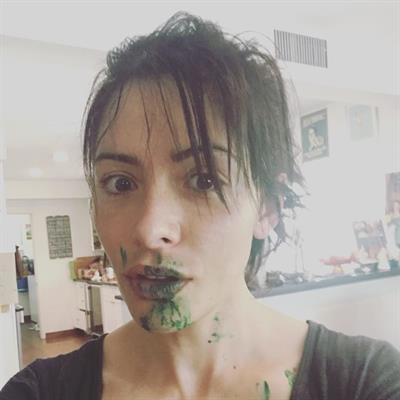 Sarah Shahi taking a selfie