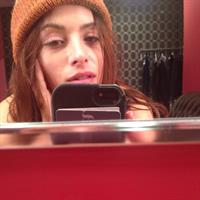 Sarah Shahi taking a selfie