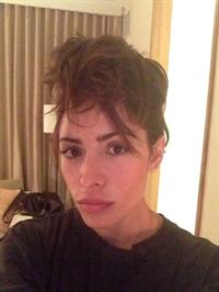 Sarah Shahi taking a selfie