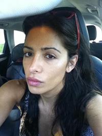 Sarah Shahi taking a selfie