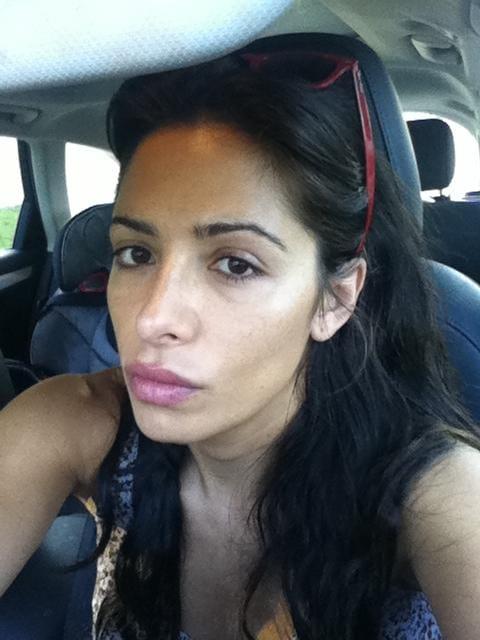 Sarah Shahi taking a selfie