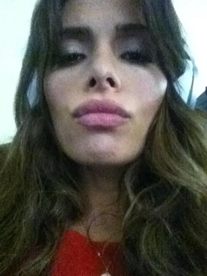 Sarah Shahi taking a selfie