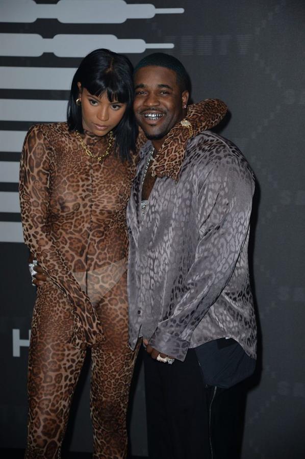 Renell Medrano braless boobs in a see through bodysuit showing off her tits seen by paparazzi at the Savage X Fenty event.











































