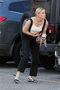 Amber Heard braless boobs in a white top showing off her tits seen by paparazzi.





















































