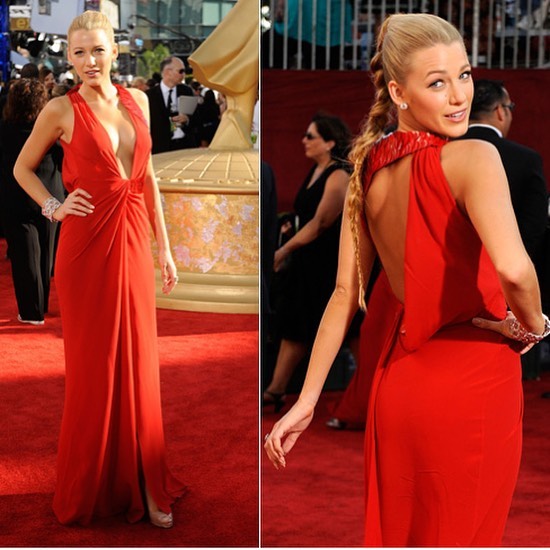 Blake Lively Pictures Blake Lively braless boobs in a low cut dress at the Emmy Awards showing nice cleavage.