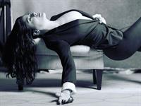 Salma Hayek braless boobs it just a revealing jacket top showing nice cleavage.











