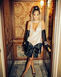 Rita Ora braless cleavage in a sexy low cut dress showing off her boobs.











































