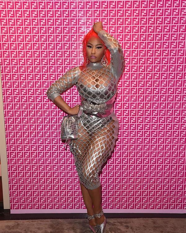 Nicki Minaj big boobs showing nice cleavage in a sexy see through dress.










































