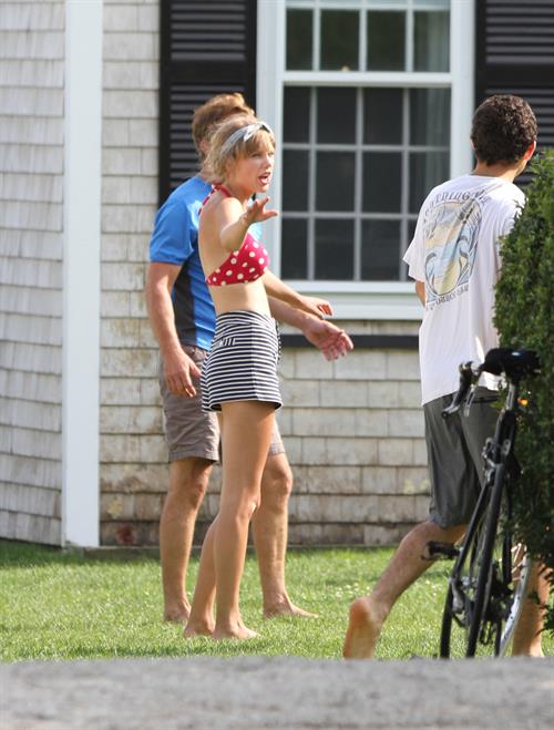 Taylor Swift Pictures Taylor Swift wearing a bikini top and swimsuit in Hyannis on April 12, 2013
