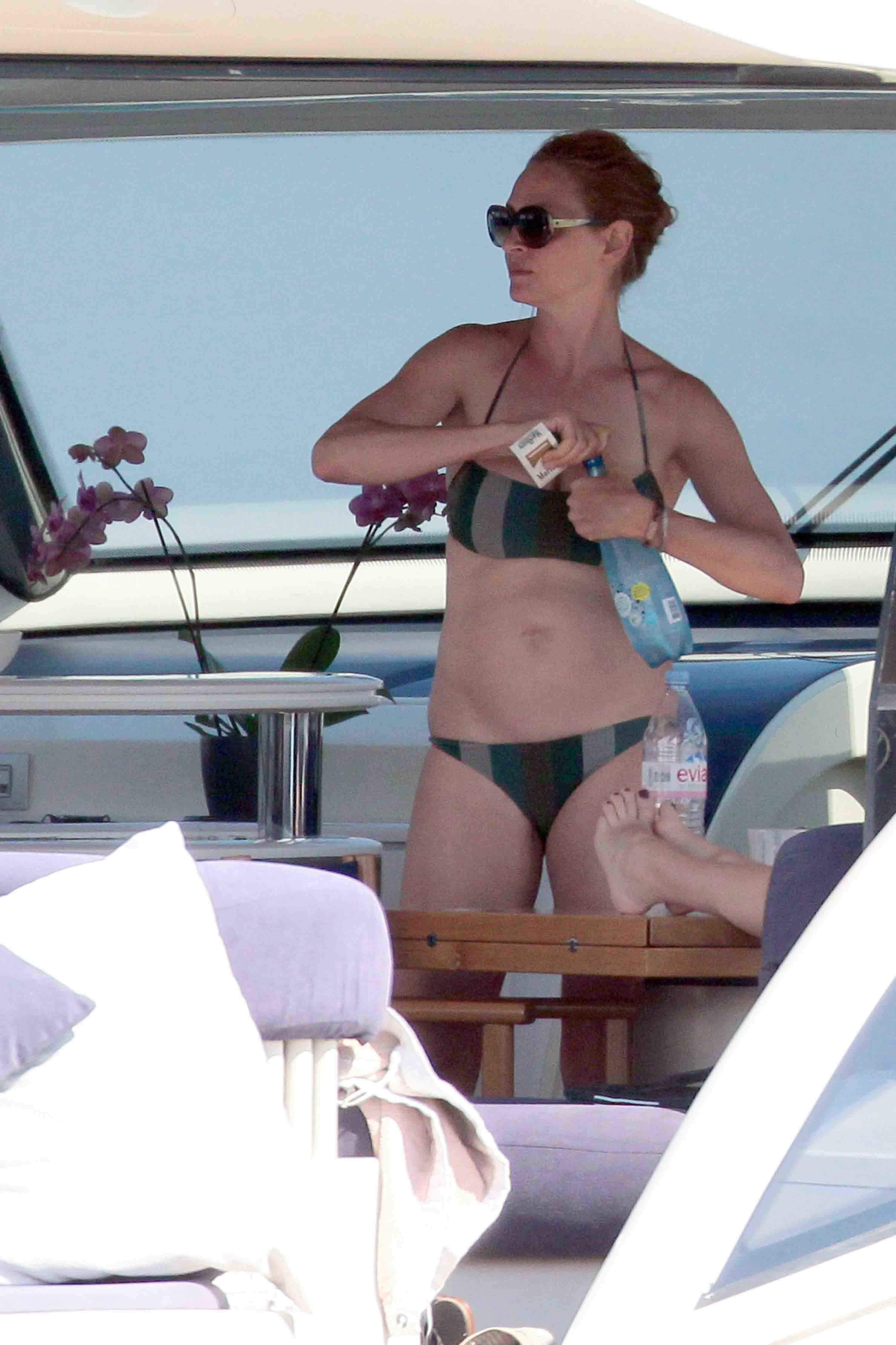 Uma Thurman on a yacht in St Trope July 6, 2013 