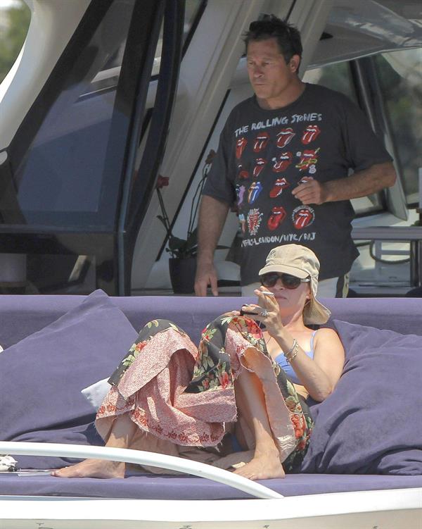 Uma Thurman wearing a bikini top on a yacht in St Tropez July 7, 2013 