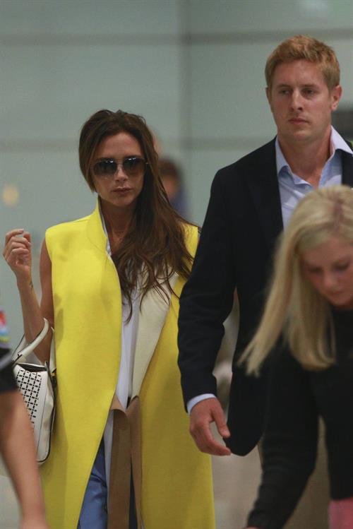 Victoria Beckham Pictures Victoria Beckham - Touches down in Beijing on June 21, 2013