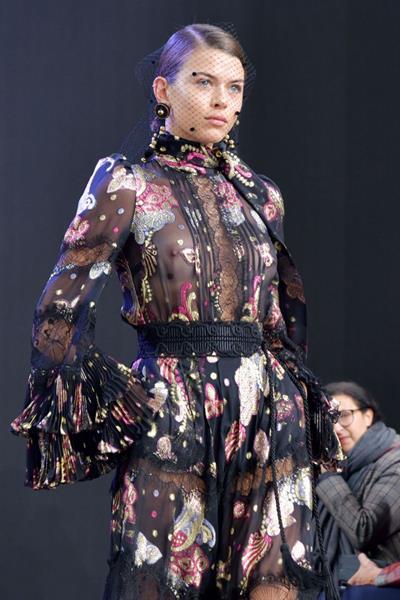 Georgia Fowler braless boobs in a see through dress showing off her tits clearly showing her nipples as she models on the runway in Paris.