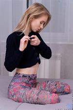 Stunning blonde hottie Light Fairy crawls into bed to wait for your touch. This horny little thing loves to play with toys when her fingers just don't quite do the trick, so enjoy yourself as she peels off her clothes and grabs an anal plug and shoves it into her ass.