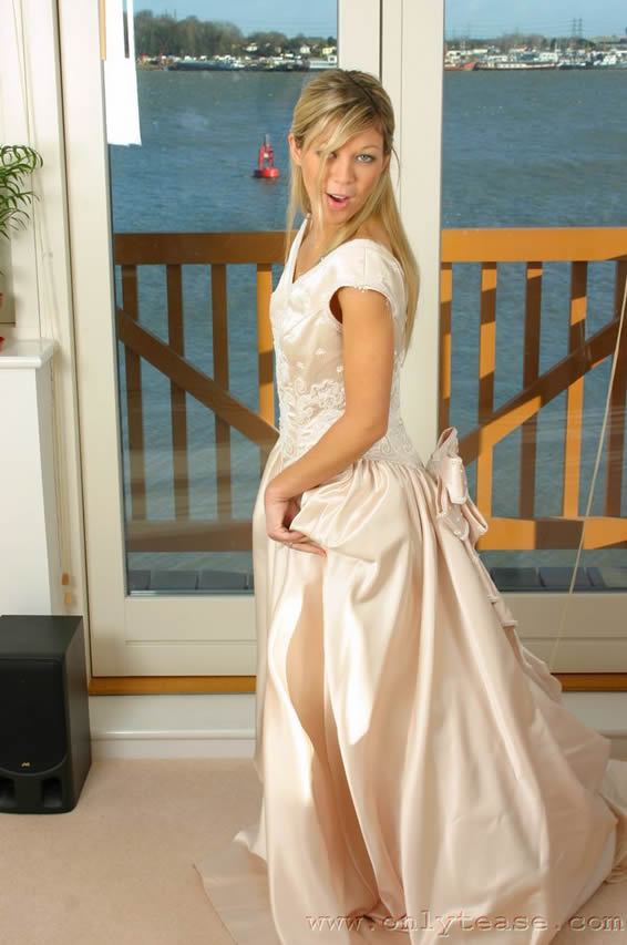  Sexy blonde in wedding dress with white lingerie 