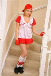  Stunning busty blonde in sexy baseball outfit.  