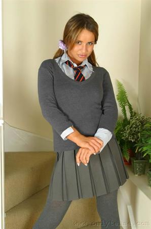 Kim Nude Pictures Sultry brunette Kim in college uniform with wool pantyhose