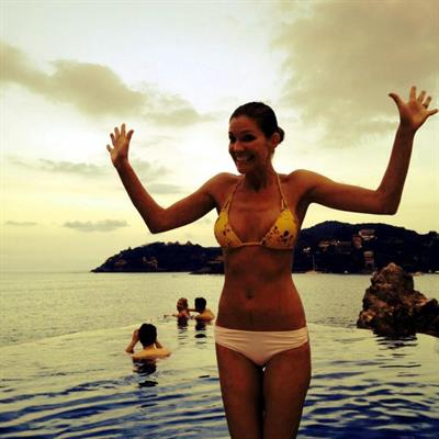 Tricia Helfer in a bikini