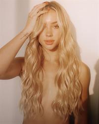 Charly Jordan topless boobs new photos with her long blonde hair covering her nude big tits.