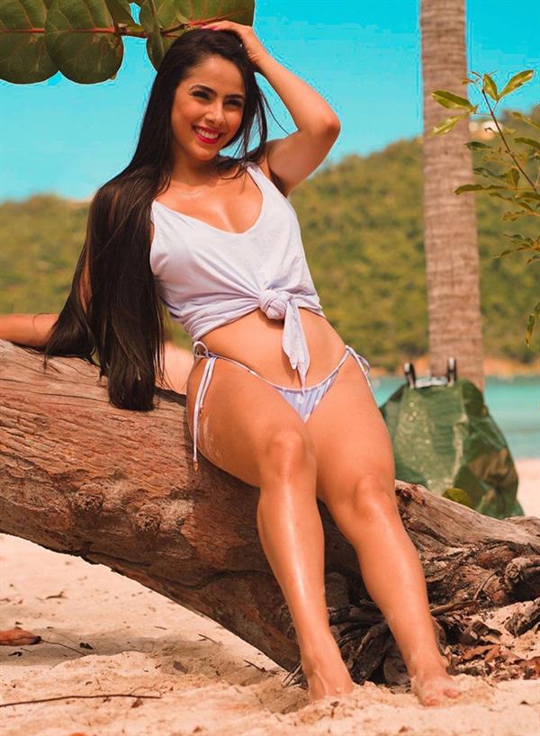 Juliana Caetano in a bikini