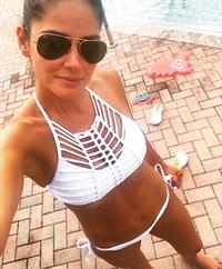 Carla rockin a bikini by her pool