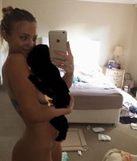 Tammy Hembrow nude new photo showing off her topless boobs and nearly showing her naked pussy.