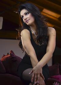 Denise Milani Photoset - Red Sofa