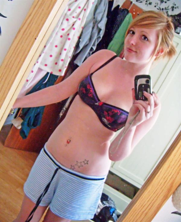 Anonymous in lingerie taking a selfie