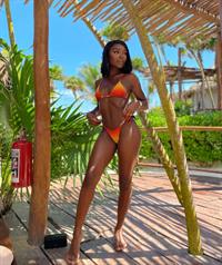 Melinda Melrose in a bikini