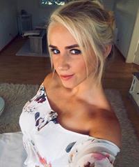 Jungle Maid taking a selfie