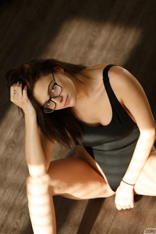 Stella Barry in a Black Bodysuit