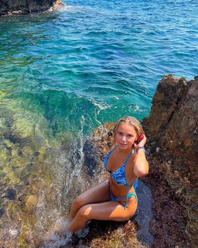 Romane Bertrand in a bikini