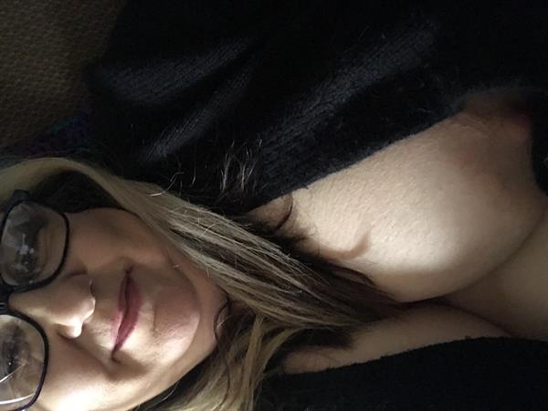 tulsa bank lady taking a selfie and - breasts