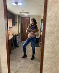 Odette Yustman taking a selfie