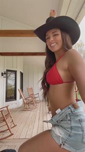 Ride 'em Cowgirl in a Red Bikini and Daisy Dukes Jean Shorts
