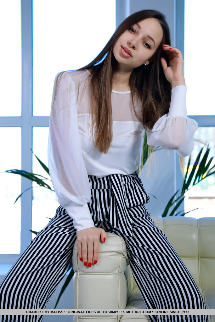 Busty Charlize Strips for Met-Art