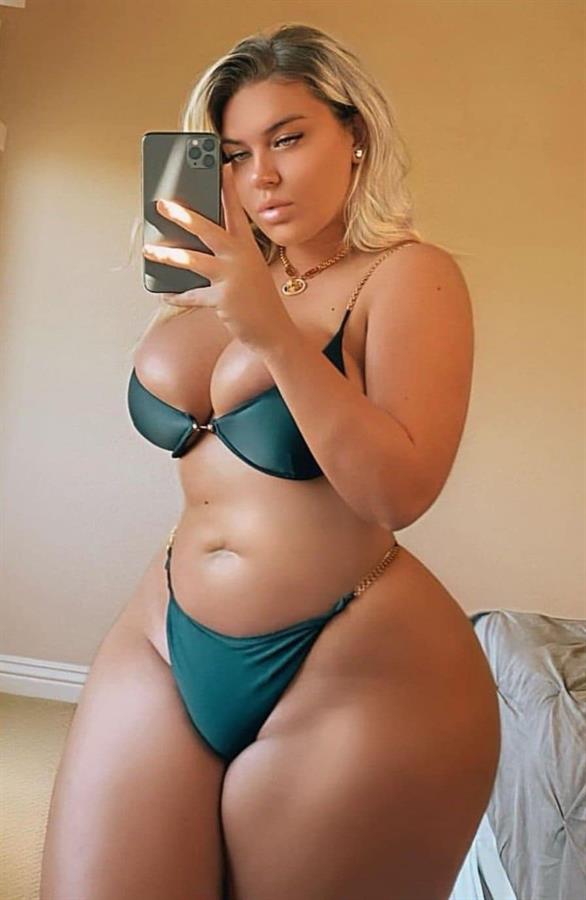 Kayla Negrino in lingerie taking a selfie