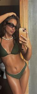 Alexandra Tsanova in a bikini taking a selfie