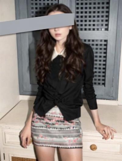 Slender brunette art model in New York City.