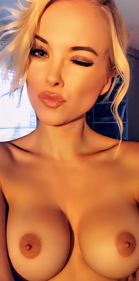 Whitney B taking a selfie and - breasts
