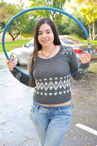 Nadine hula hoops naked outside