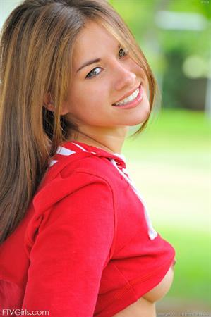 Shyla FTV Nude Pictures Shyla using a dildo outside on the bench