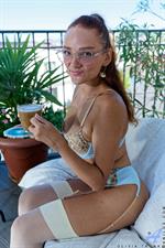 So sexy and fuckable in her lingerie Olivia Trunk enjoys breakfast on the balcony before deciding to have her own Hornby self for dessert.