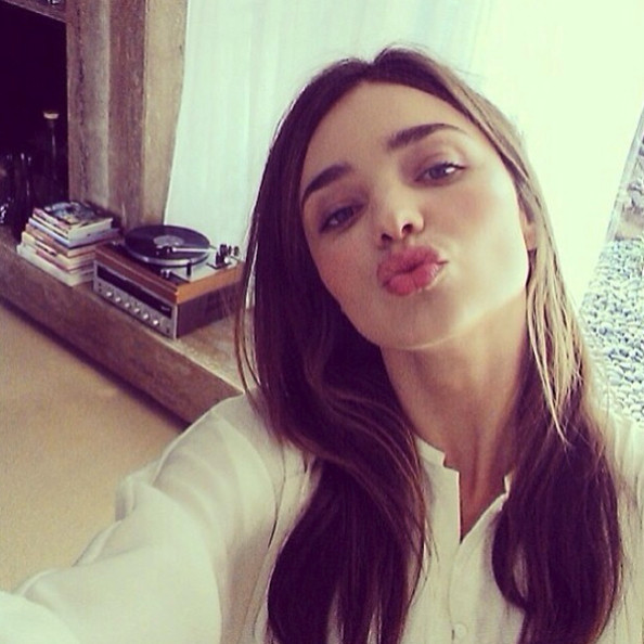 Miranda Kerr taking a selfie