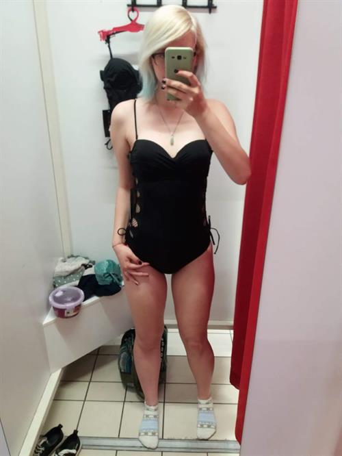 Katie in a bikini taking a selfie