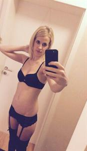 Carina in lingerie taking a selfie